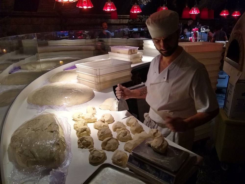 Mother - chef preparing the dough