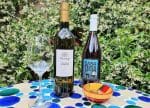 Bottles of Cara Sucia and Masssaya White wines