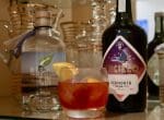 Classic Negroni with Vermouth and Gin bottles