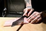 Sushi on Jones slicing fish