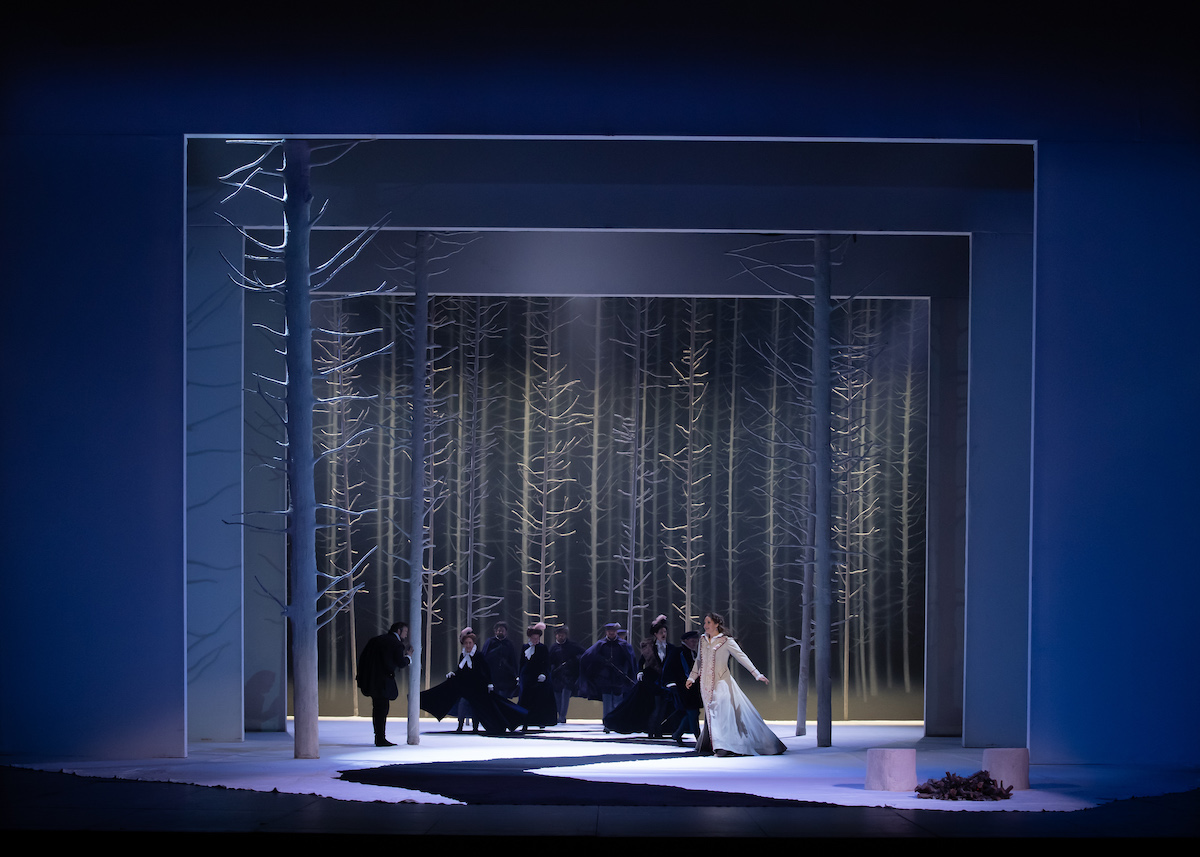 A snow covered stagw with white bare trees. Act I, ROH Don Carlo &copy; Bill Cooper
