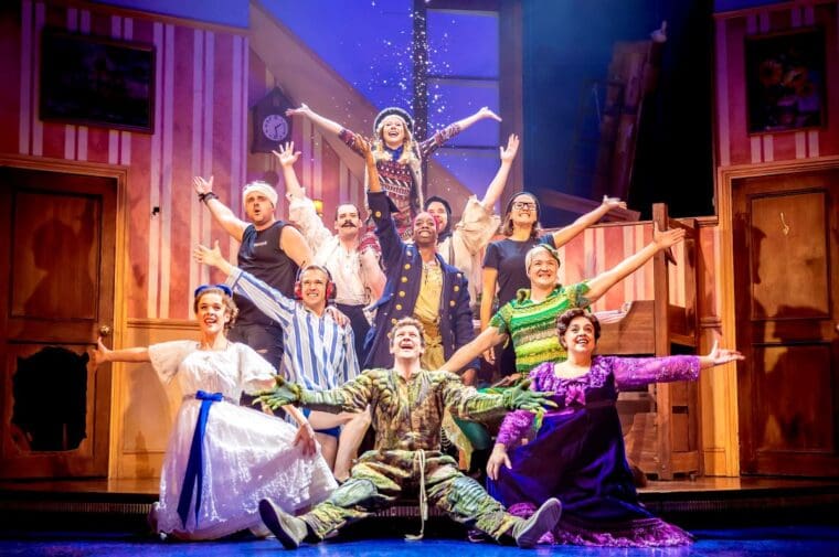 The company of Peter Pan Goes Wrong playing at the Lyric Theatre London