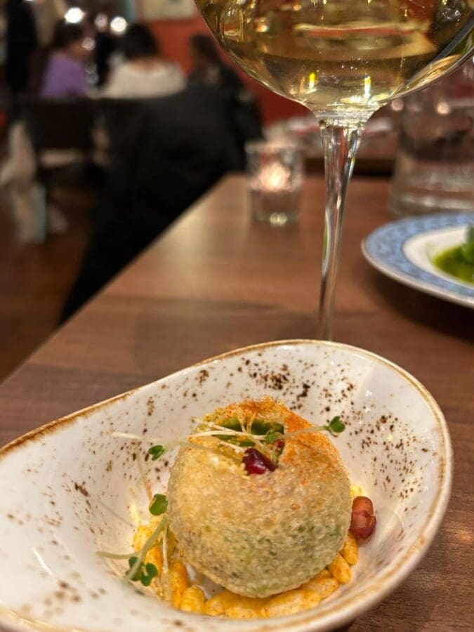 A small crispy chaat ball as a taster at Colonel Saab Trafalgar Square Restaurant