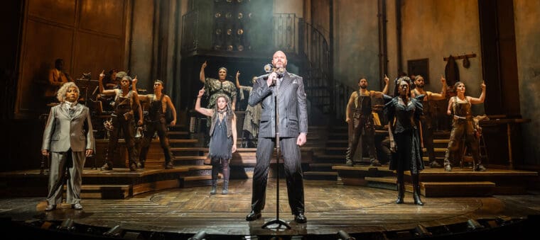 14. HADESTOWN Lyric Theatre, London. Zachary James and the company. Photo credit Marc Brenner