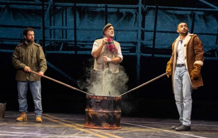 Nathan McMullen, Philip Whitchurch and Aron Julius in Boys from the Blackstuff at the National Theatre (c) Alastair Muir