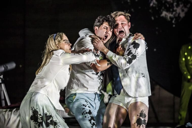 Camilla Harris as Helena, Caspar Singh as Lysander and James Newby as Demetrius