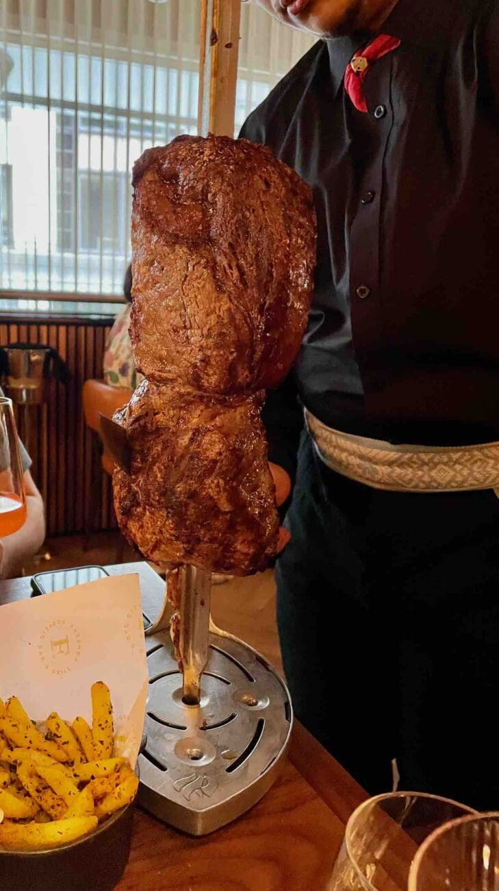 Meat on long skewers at Fazenda