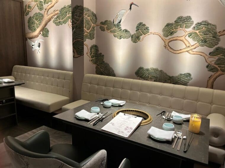 Picture of the KGK restaurant interior with table set for dinner.