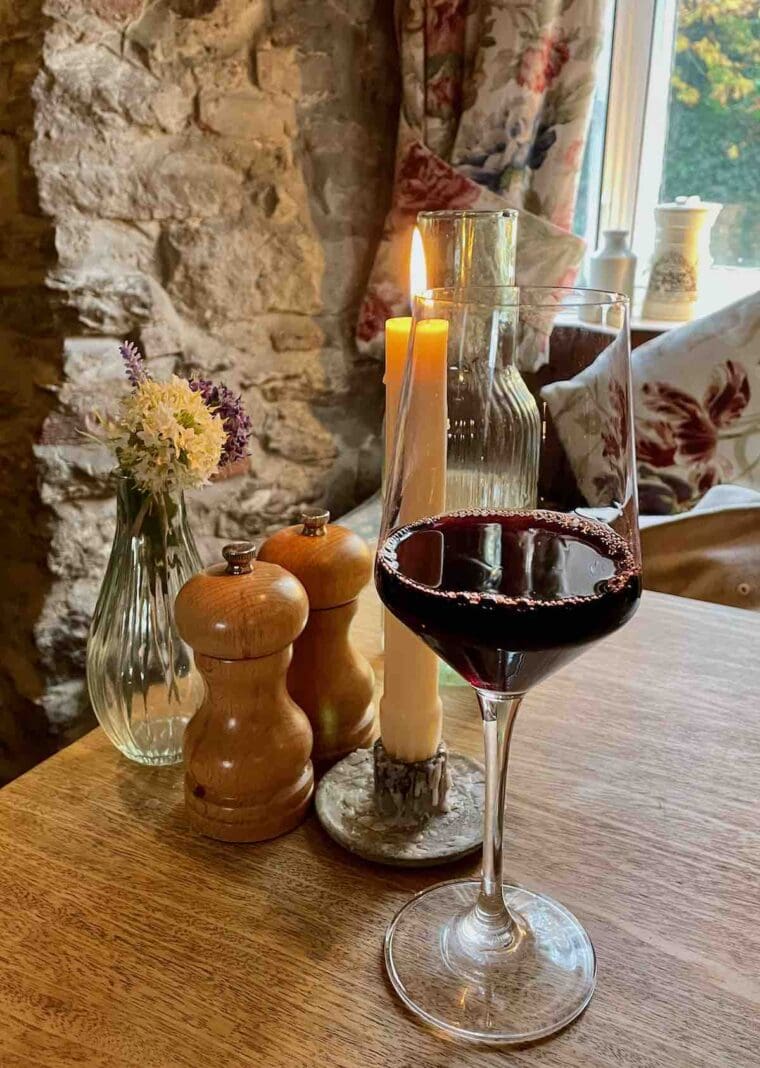 Glass of wine and a candle, The Lamb