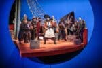 John Savournini and the Cast of Eno's The Pirates of Penzance