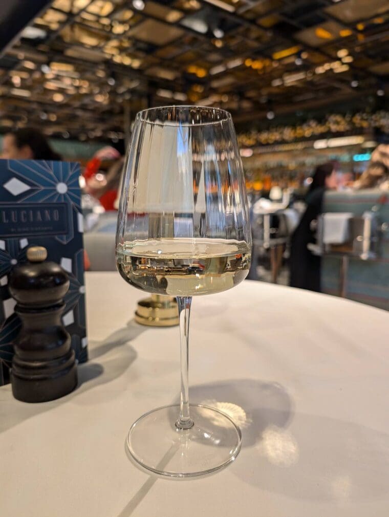 Wine in a glass on the table at Luciano Restaurant