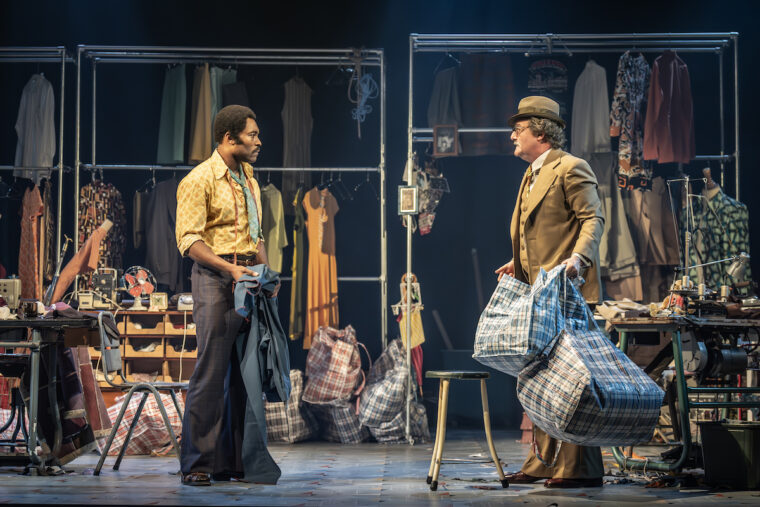 Cast of Alterations at the National Theatre, Walker on stage being handed bags