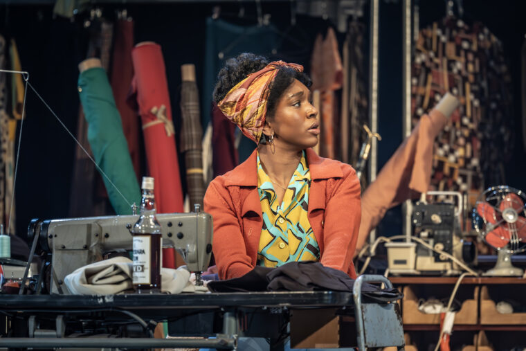 Cast of Alterations at the National Theatre, Darlene by a sewing machine