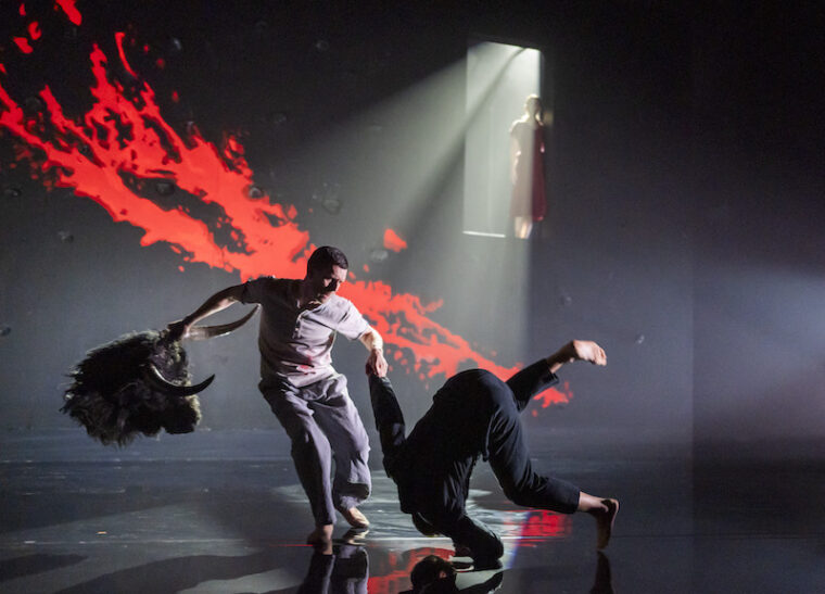 Minotaur and Theseus battling onstage in the RBO's production of Phaedra + Minotaur