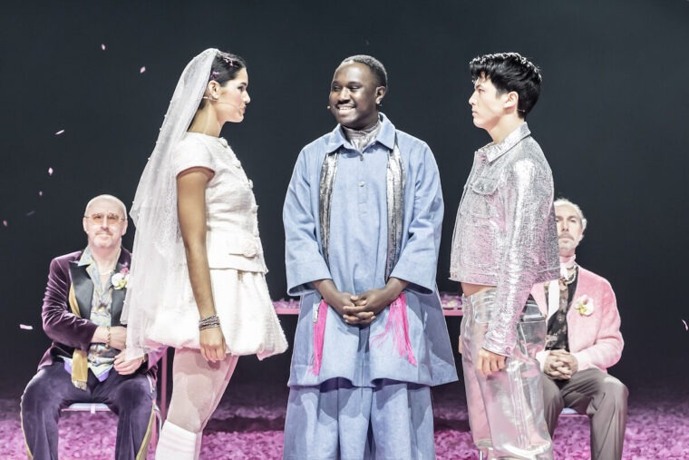 Much Ado About Nothing. Mara Huf (Hero), Phillip Olagoke (Friar Francis) & James Phoon (Claudio). Credit - Marc Brenner.