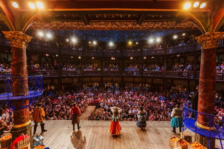 The Stage at the globe theatre with a full audience