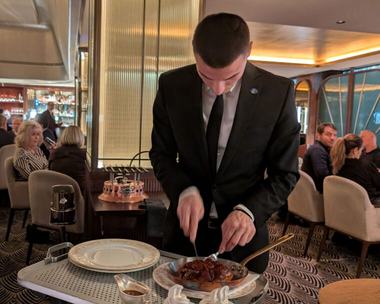 Serving the Tart Tatin at the Savoy Grill