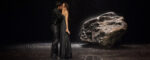 Vollmond - Tanztheater Wuppertal Pina Bausch - couple in black kissing - Image Credit Martin Argyroglo
