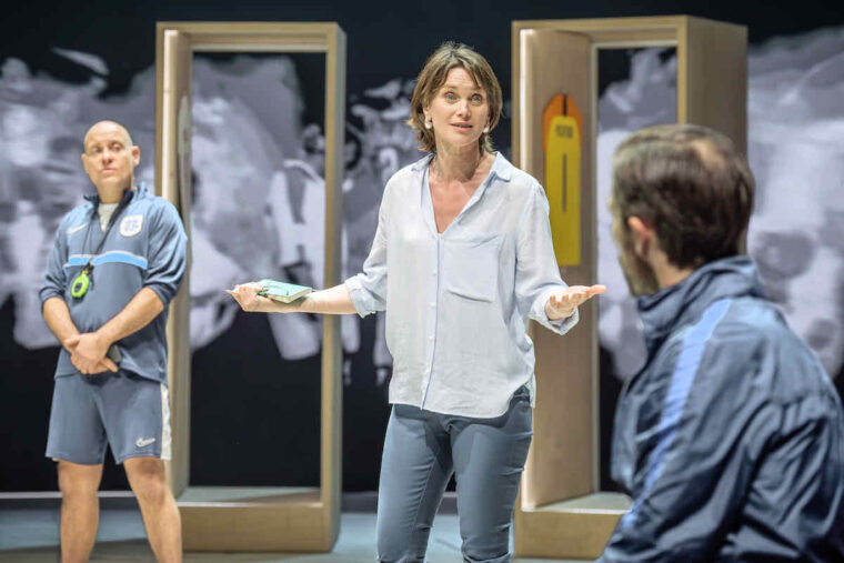 NT Dear England, Liz White (Centre) as psychologist Pippa Grange. Photo by Marc Brenner.