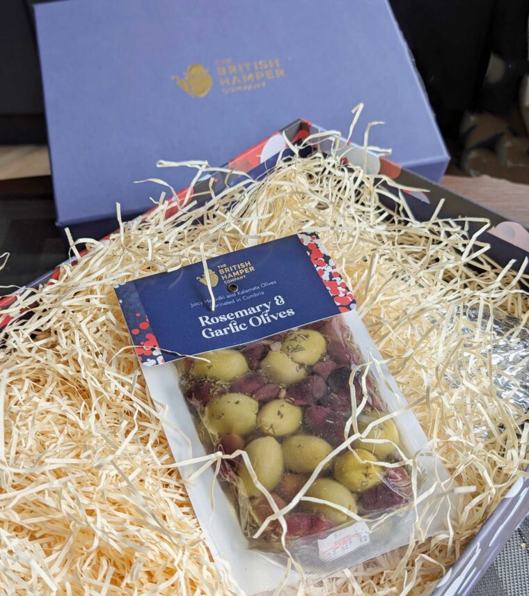 Light olives on top of the hamper