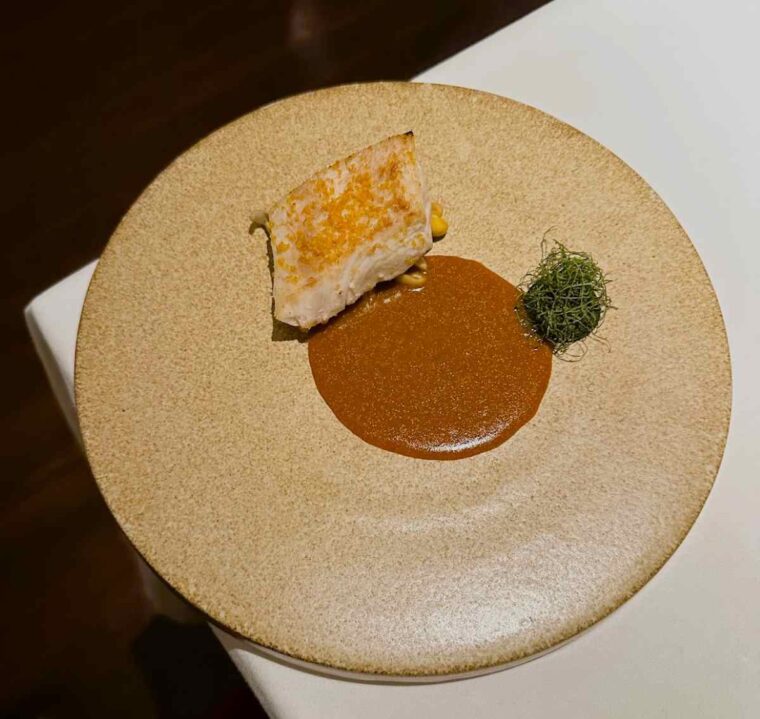 KHAAN fine dining restaurant Bangkok seasonal catch by local fishermen with shrubby basil and spicy Thai bisque