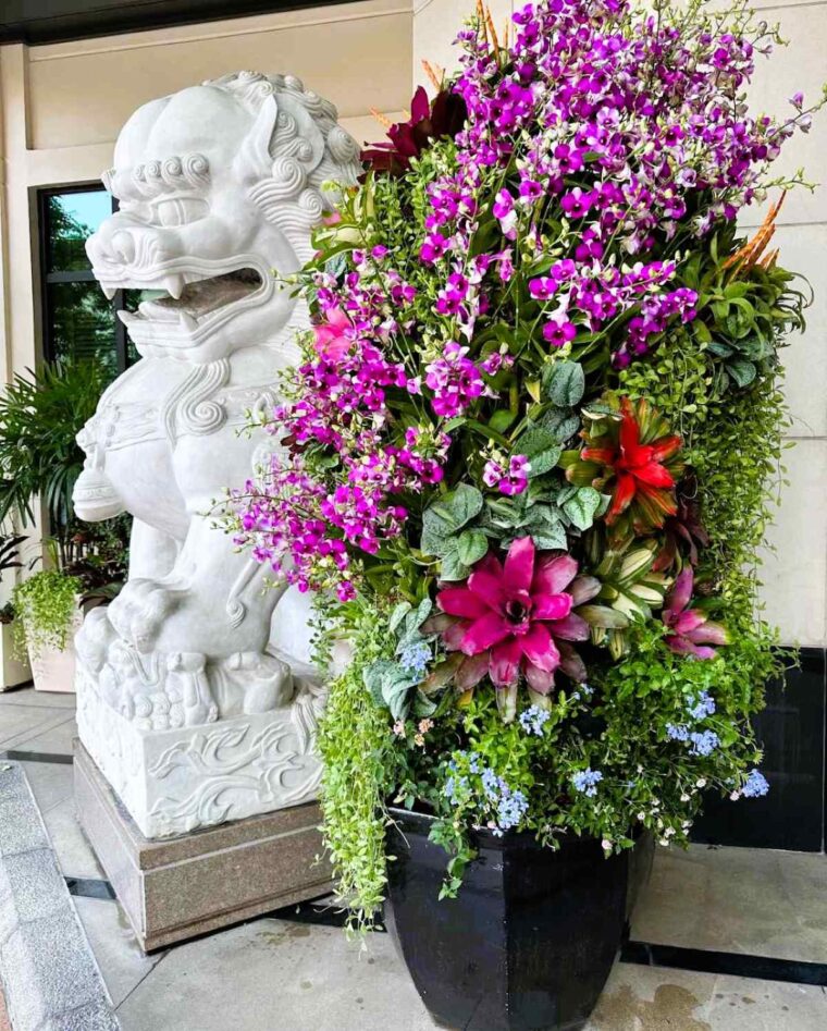 The Peninsula Bangkok is filled with artwork, sculpture and exotic flower displays throughout the hotel