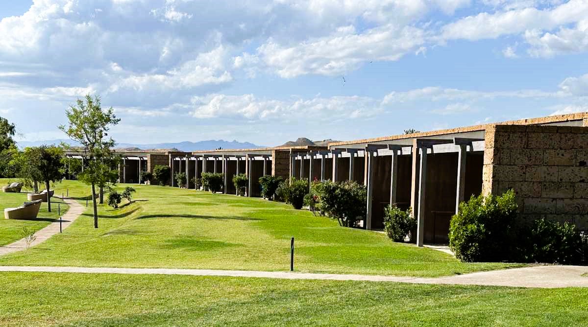 The 90 suites at ADLER Spa Resort Sicilia are constructed from natural local materials and blend into the hillside.