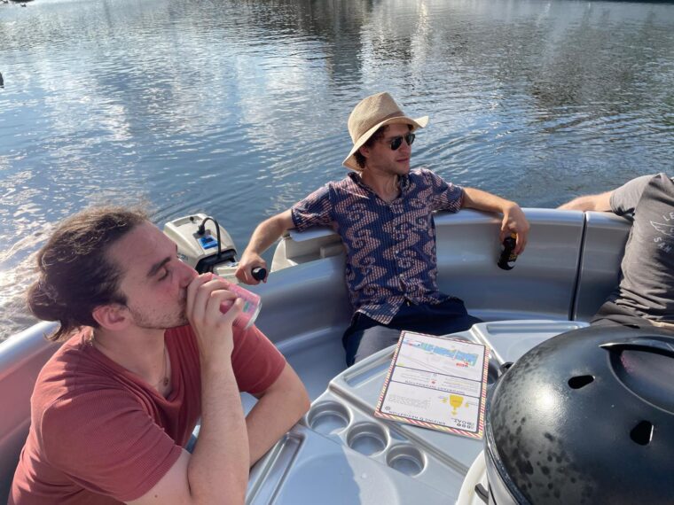 Skuna Boats - messing about on the water at Canary Wharf, London