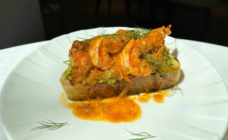 Adeline at The Memoir Club starter dish of harissa king prawns