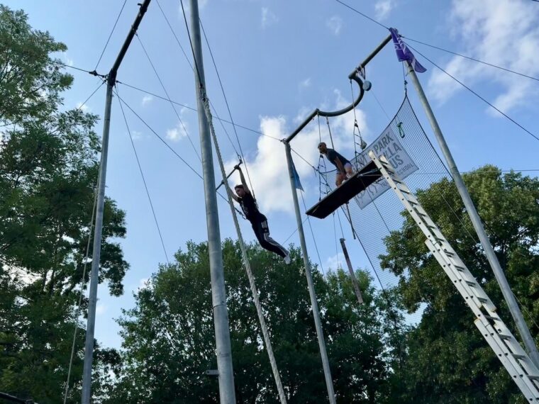 Gorilla Circus Trapeze School mid air