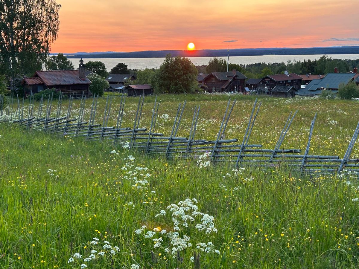 Sunset over the village of Tallberg by Lake Siljan in Sweden.