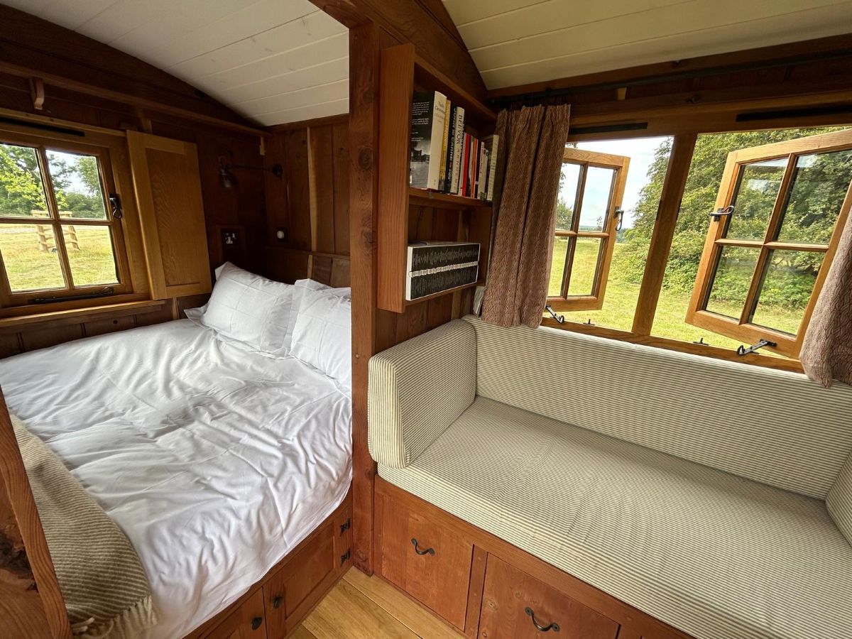 Interior view of Redwood Shepherd's Hut at Stonor Estate