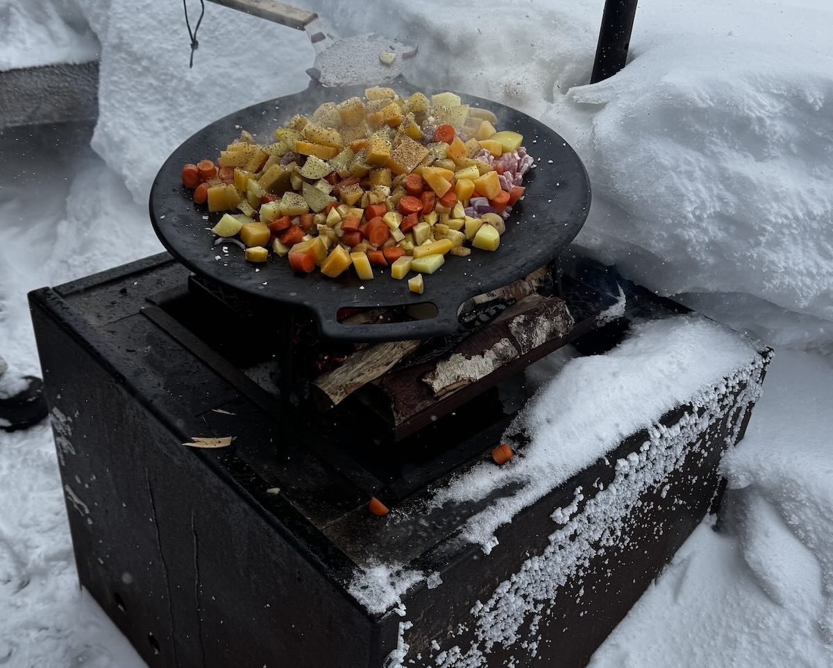Pytt i Panne cooking on the open fire