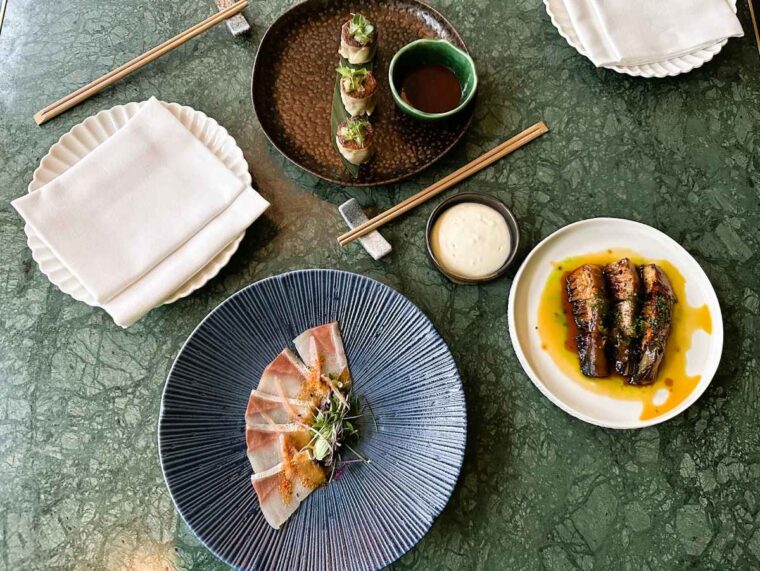 The Fuji Grill small plates selection - bamboo shoots, confit duck shumai dumplings, and yellowtail usuzukuri