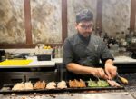 Junsei chef grilling skewers
