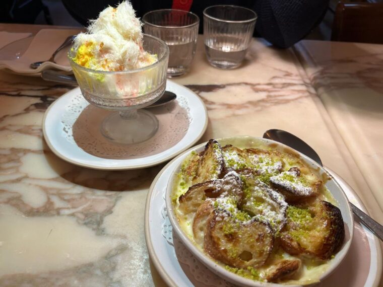 A plate of Egyptian bread-and-butter pudding and a glass of saffron ice-cream