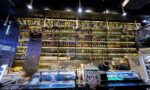 High Yaki interior photo of sushi bar and bottle backdrop