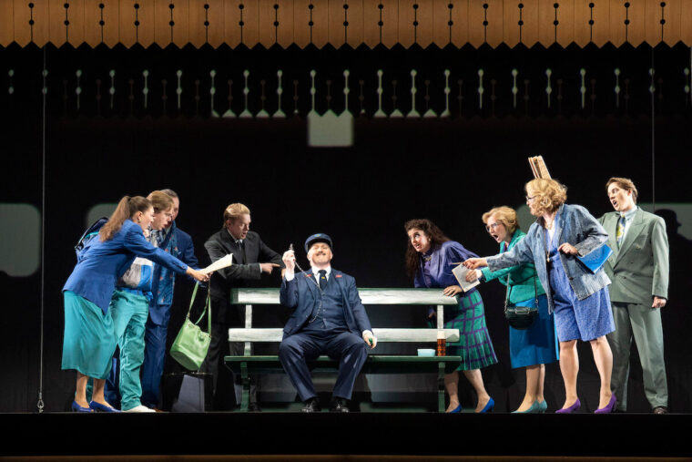 Mr Perks (Gavan Ring) and members of The Glyndebourne Chorus. The Railway Children, Glyndebourne Autumn Season 2025