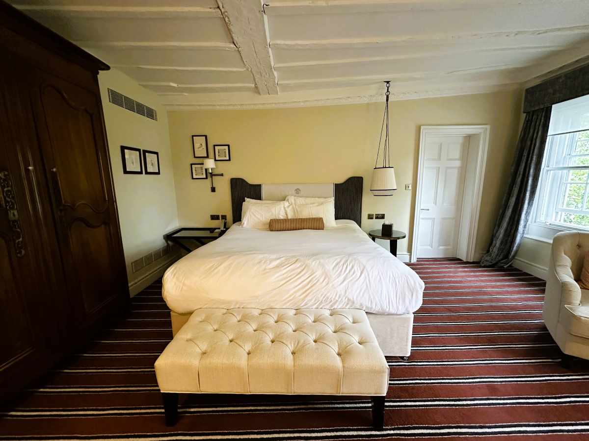 The Relais Henley bedroom is large with traditional furnishings and modern touches