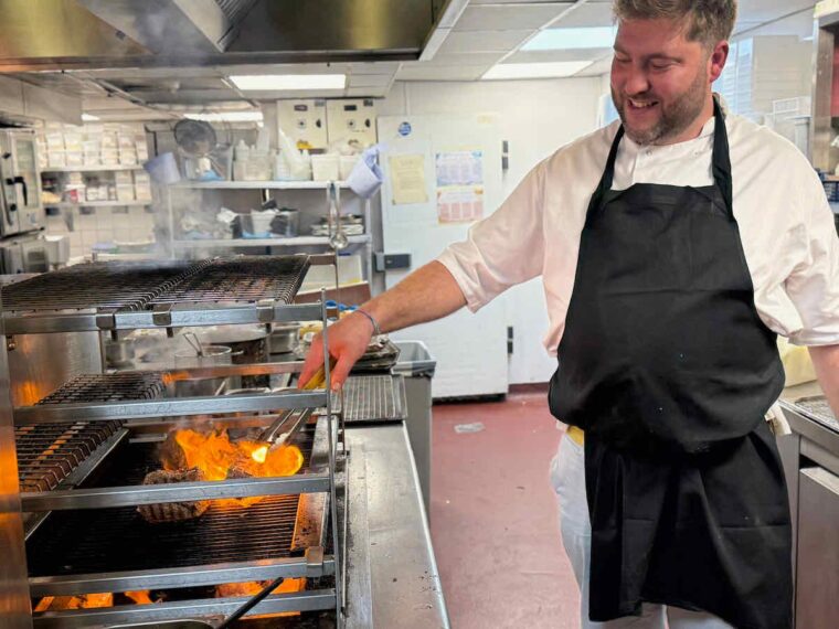 Man with fire - Oliver Gladwin flambes the meat