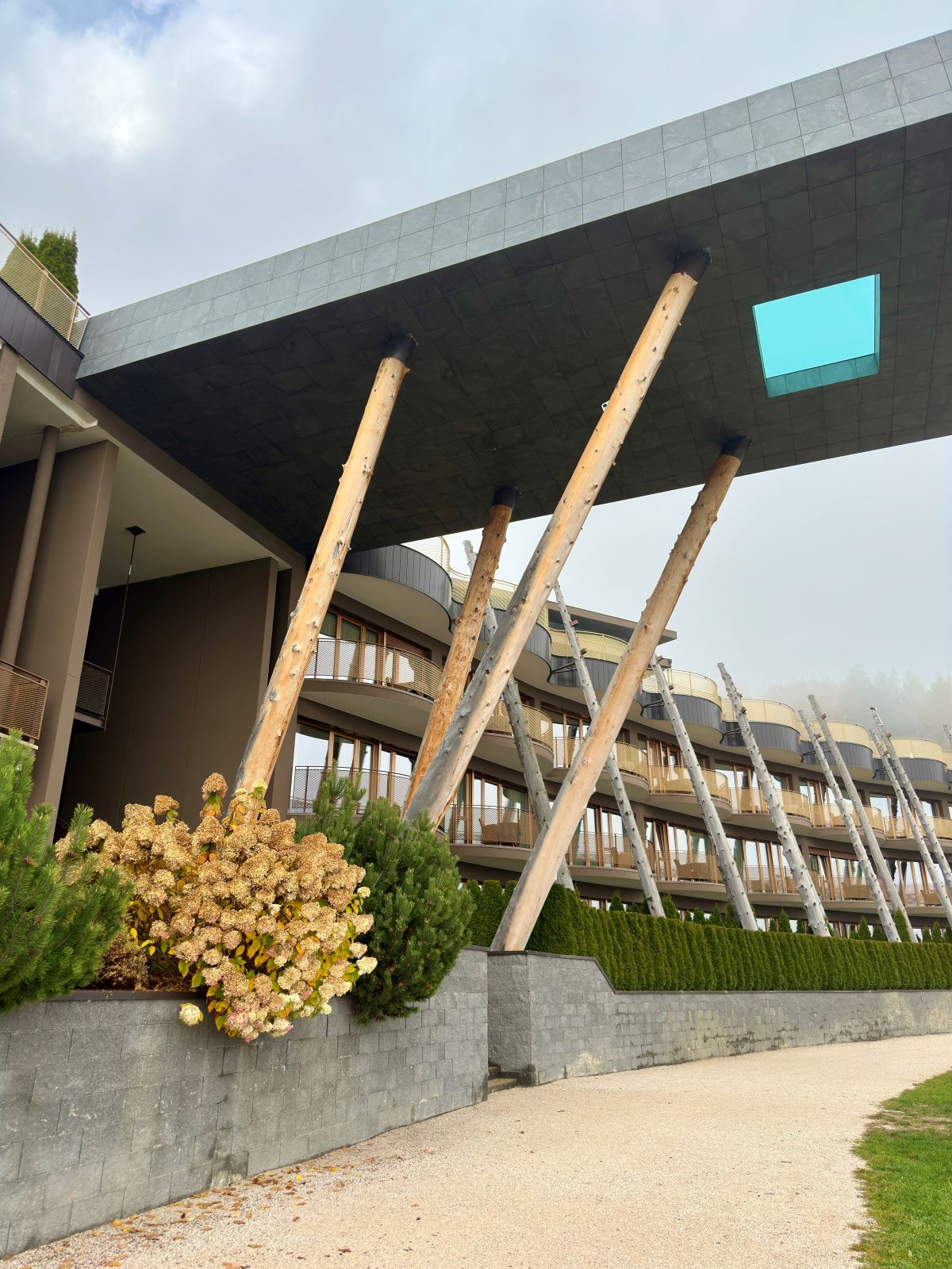 The SkyPool at Alpin Panorama Hotel Hubertus, a 25-metre glass-bottomed infinity pool suspended above the Dolomites.