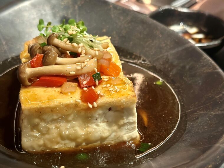Dubu Steak was a highlight - a pan-seared tofu ‘steak’ served with a glossy soy glaze. 