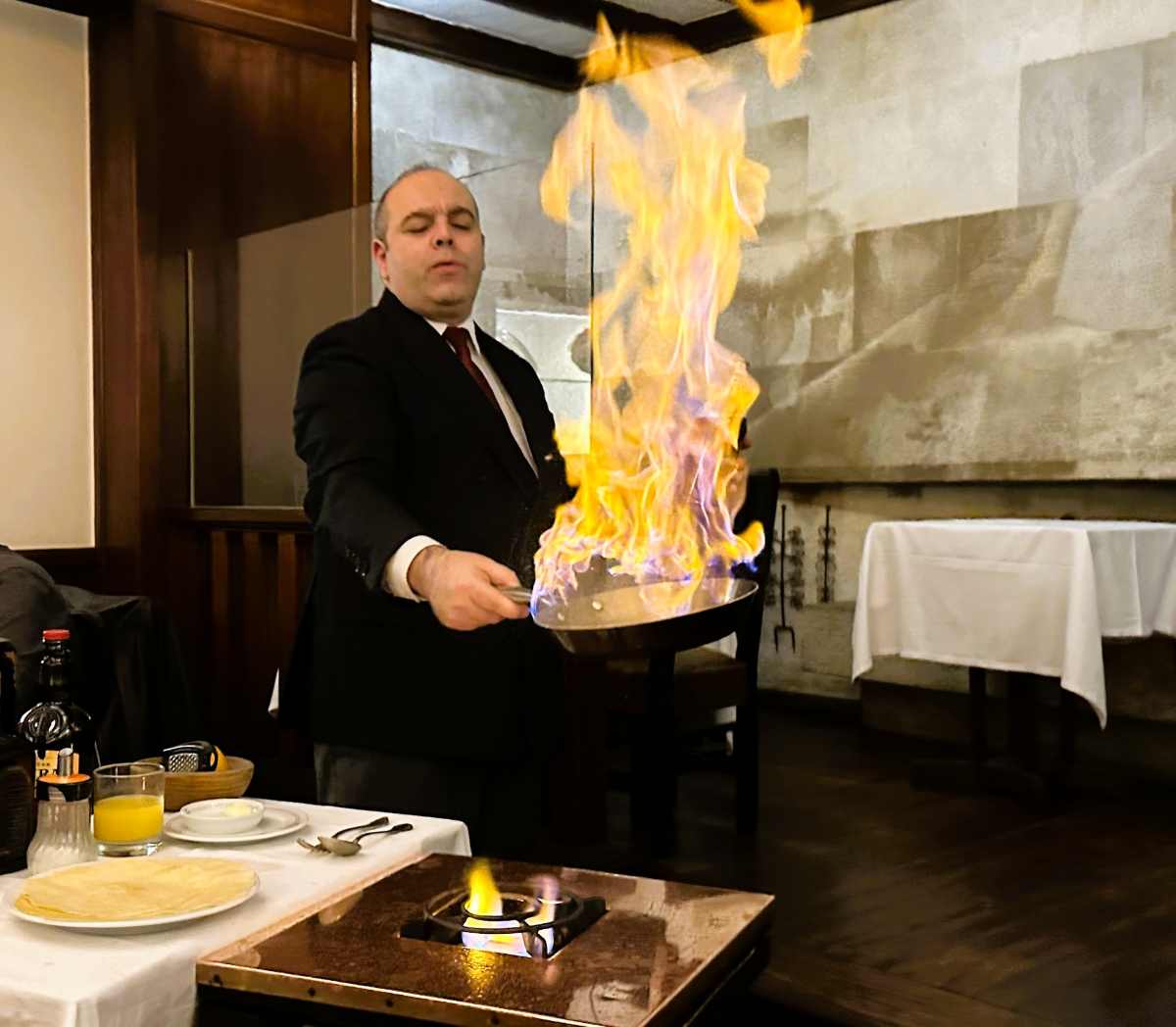 Making crepes Suzette at Lisbon's Gambrinus restaurant