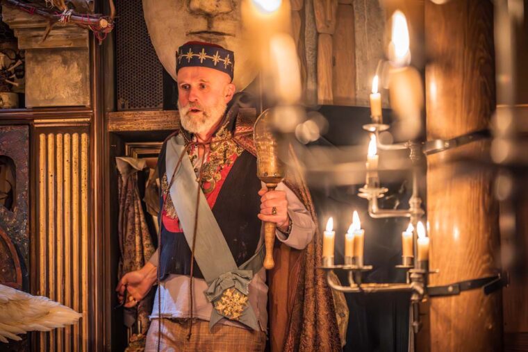 The Tempest - Prospero in the candlelit Sam Wanamaker Theatre at the Globe