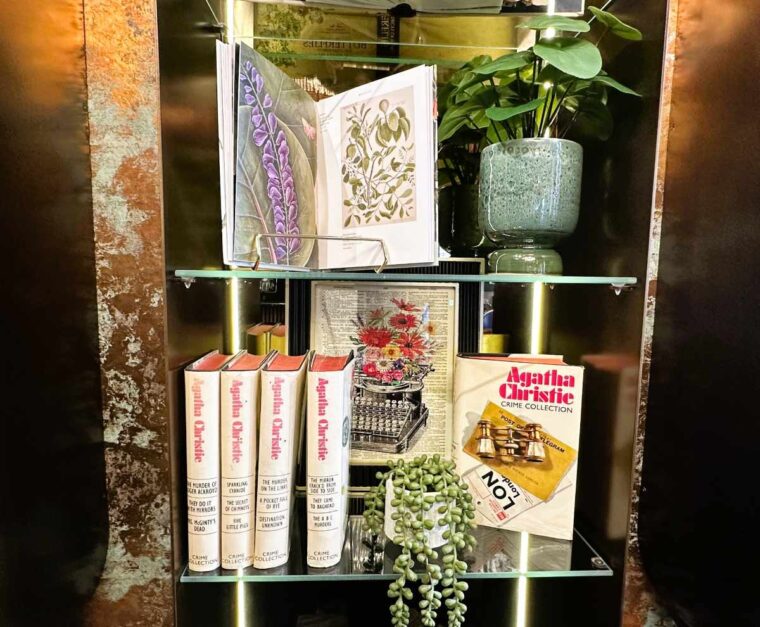 The Kensington Hideaway has books on display in the lobby