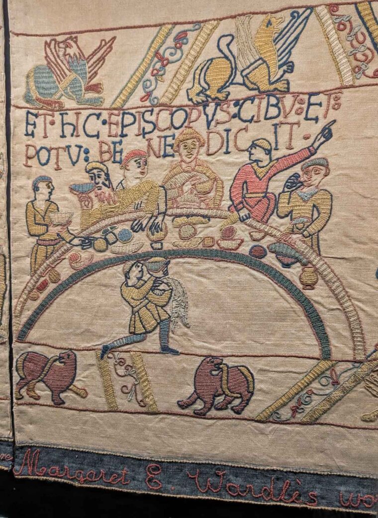 A feast embroidered by Margaret E Wardle - featuring Bishop Odo in a 'last supper' styled setting