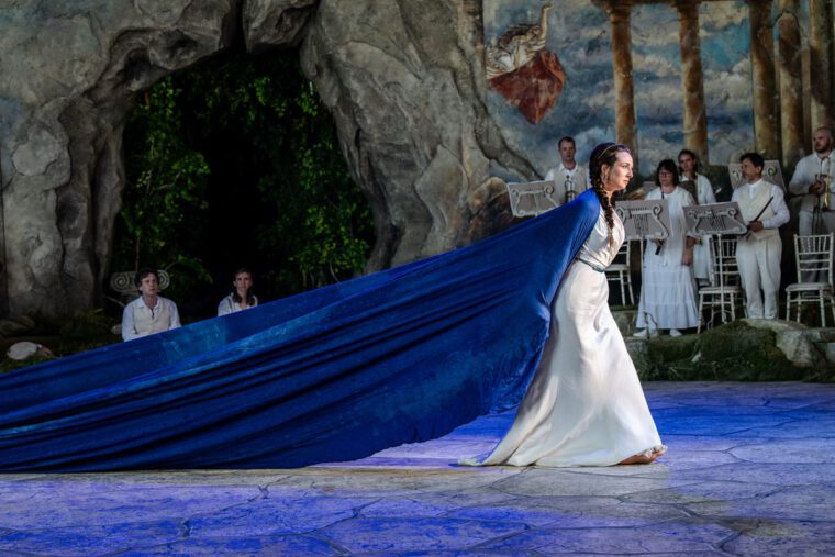 Cecilia Hall as Penelope wearing her blue cloak in Ulisse, Garsington Opera 2026