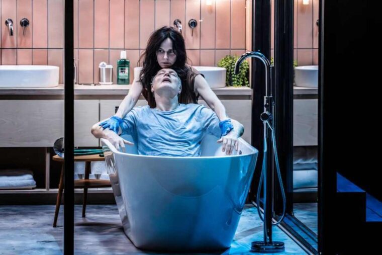 Mary-Louise Parker, David Morrissey in The Oresteia at The Bridge Theatre, credit Johan Persson
