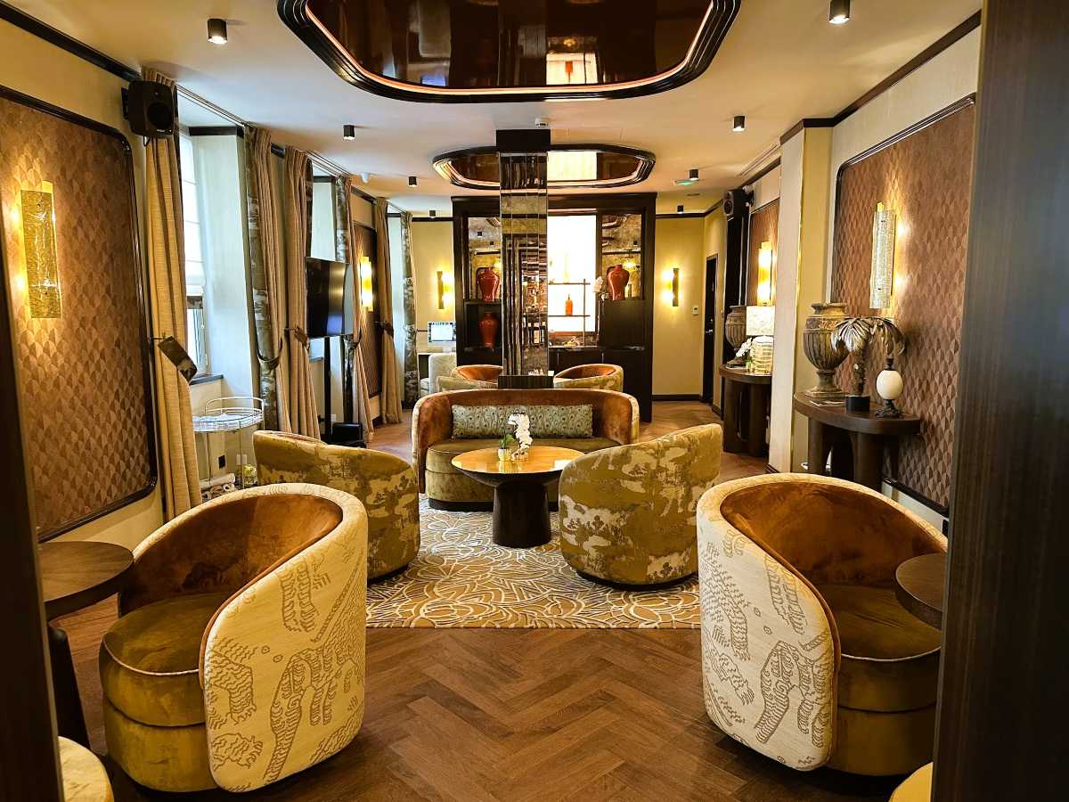 La Bourdonnais has an elegant and welcoming lounge area filled with plush furnishings and artefacts.