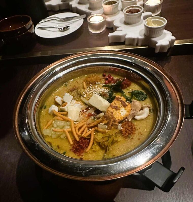 Tresind Khichdi of India with toppings